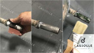 Graisser l'axe d'un diable pour faciliter la rotation
